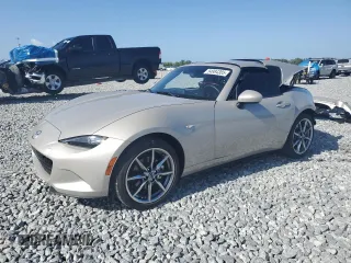 2023 Mazda MX-5 Miata Grand Touring z VIN JM1NDAM70P0551336, wystawiony jako Copart lot #54984385 z przebiegiem 10 948 mil mil oraz Szkoda całkowita • Salvage title. Historia ofert i sprzedaży dostępna na DreamBid. Obrazek 1.