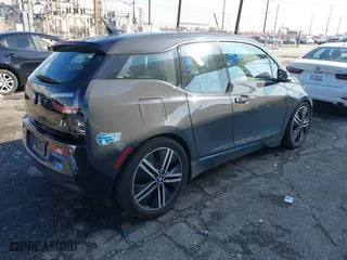 2015 BMW i3 with VIN WBY1Z4C53FV502262, listed as a IAAI auction lot 41746285 with 74,157 mi miles. Bid and sale history available at carsss.com. Image 4.