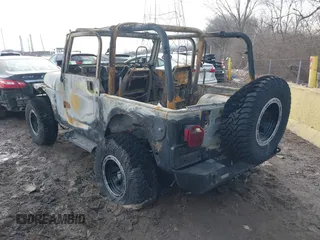 2003 Jeep Wrangler Sport with VIN 1J4FA49S93P374406, listed as a IAAI auction lot 41648982 with Not provided miles and . Bid and sale history available at DreamBid. Image 3.