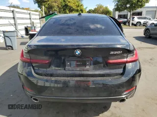 2025 BMW 3 Series 330i with VIN 3MW69CW05S8F12058, listed as a Copart auction lot 88821005 with 2,733 mi miles and Salvage Title. Bid and sale history available at carsss.com. Image 6.