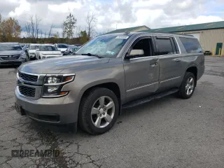 2018 Chevrolet Suburban LS with VIN 1GNSKGKC8JR396475, listed as a Copart auction lot 75859654 with 67,080 mi miles and Salvage Title. Bid and sale history available at DreamBid. Image 1.