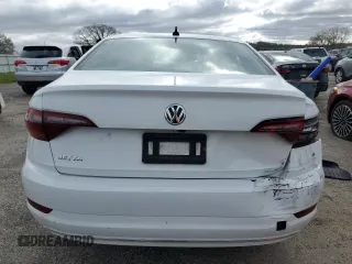2019 Volkswagen Jetta SEL z VIN 3VWE57BU6KM081373, wystawiony jako Copart lot #54739325 z przebiegiem 65 381 mil mil oraz Czysty tytuł • Clean title. Historia ofert i sprzedaży dostępna na DreamBid. Obrazek 6.