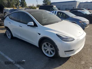 2021 Tesla Model Y Long Range with VIN 5YJYGDEE4MF204219, listed as a Copart auction lot 47429865 with 92,821 mi miles and Salvage Title. Bid and sale history available at DreamBid. Image 4.