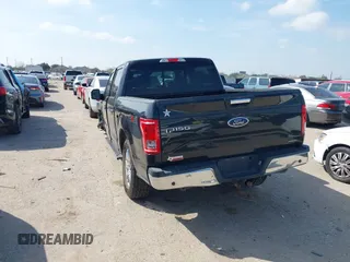 2015 Ford F-150 XLT with VIN 1FTEW1EF4FKD15422, listed as a IAAI auction lot 41593431 with 112,102 mi miles. Bid and sale history available at carsss.com. Image 3.