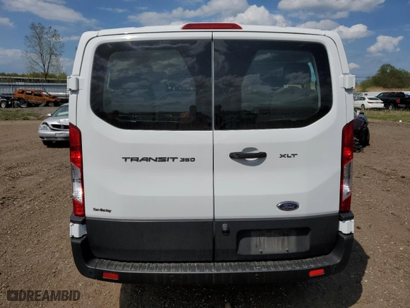 2021 Ford Transit Passenger Wagon XL with VIN 1FBAX2Y88MKA30996, listed as a Copart auction lot 52709324 with 86,753 mi miles and Salvage Title. Bid and sale history available at carsss.com. Image 6.