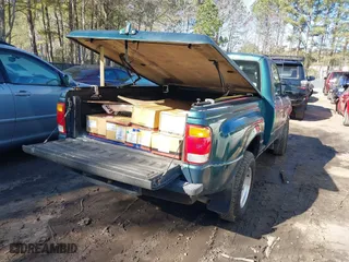 1998 Ford Ranger XL with VIN 1FTYR10CXWTA84196, listed as a IAAI auction lot 41704818 with 199,566 mi miles. Bid and sale history available at carsss.com. Image 4.