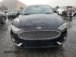2020 Ford Fusion Titanium with VIN 3FA6P0D94LR153375, listed as a Copart auction lot 59609415 with 104,292 mi miles and Clean title. Bid and sale history available at DreamBid. Image 5.