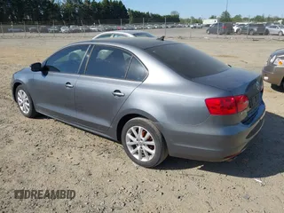2012 Volkswagen Jetta Sedan SE w/Convenience PZEV with VIN 3VWDP7AJ4CM300149, listed as a IAAI auction lot 42116256 with 111,681 mi miles. Bid and sale history available at carsss.com. Image 3.