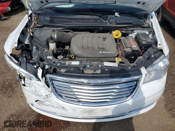 2015 Chrysler Town & Country Touring L z VIN 2C4RC1CG9FR610961, wystawiony jako Copart lot #52719965 z przebiegiem 150 148 mil mil oraz Szkoda całkowita • Salvage title. Historia ofert i sprzedaży dostępna na DreamBid. Obrazek 12.