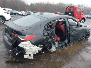 2024 BMW i4 M50 z VIN WBY33AW00RFS06591, wystawiony jako IAAI lot #41863252 z przebiegiem 15 260 mil mil oraz . Historia ofert i sprzedaży dostępna na DreamBid. Obrazek 19.