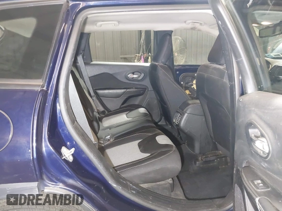 2015 Jeep Cherokee Sport with VIN 1C4PJMAB3FW564055, listed as a IAAI auction lot 42434835 with 237,027 mi miles and . Bid and sale history available at DreamBid. Image 8.