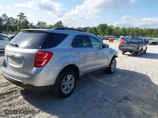 2017 Chevrolet Equinox LT with VIN 2GNALCEK0H1613881, listed as a IAAI auction lot 42017379 with 100,588 mi miles. Bid and sale history available at carsss.com. Image 4.