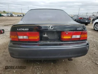 1997 Lexus ES 300 Luxury Sport Sdn with VIN JT8BF22G2V0059232, listed as a Copart auction lot 83820544 with 285,436 mi miles and Salvage Title. Bid and sale history available at carsss.com. Image 6.