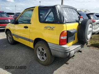 2002 Chevrolet Tracker z VIN 2CNBJ18C326943340, wystawiony jako Copart lot #74628774 z przebiegiem Nie podano mil oraz Szkoda całkowita • Salvage title. Historia ofert i sprzedaży dostępna na DreamBid. Obrazek 2.