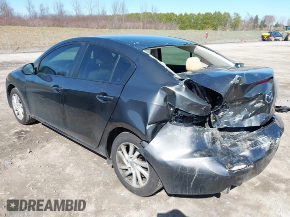 2012 Mazda Mazda3 i Touring with VIN JM1BL1V77C1645013, listed as a IAAI auction lot 41964186 with 129,320 mi miles. Bid and sale history available at carsss.com. Image 3.