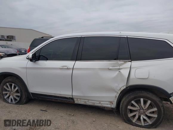 2020 Honda Pilot EX-L with VIN 5FNYF5H55LB029238, listed as a IAAI auction lot 41330490 with 116,787 mi miles. Bid and sale history available at carsss.com. Image 6.