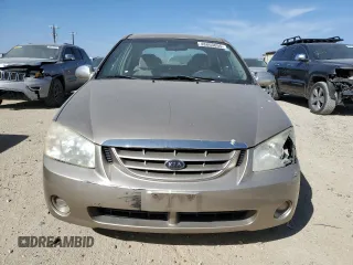 2006 Kia Spectra EX with VIN KNAFE121565364950, listed as a Copart auction lot 48860895 with 209,615 mi miles and Salvage Title. Bid and sale history available at DreamBid. Image 5.