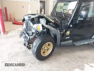 2006 Jeep Wrangler Sport with VIN 1J4FA49S96P733712, listed as a IAAI auction lot 41572913 with 93,511 mi miles. Bid and sale history available at carsss.com. Image 6.