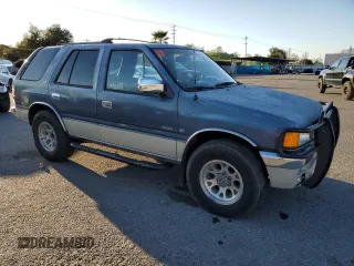 1995 Isuzu Rodeo z VIN 4S2CM58V2S4361566, wystawiony jako Copart lot #48424065 z przebiegiem 241 207 mil mil oraz Czysty tytuł • Clean title. Historia ofert i sprzedaży dostępna na DreamBid. Obrazek 4.