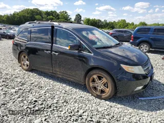 2011 Honda Odyssey Touring с VIN 5FNRL5H95BB011577, выставлен на аукционе Copart как лот 58445085 с пробегом 150 797 миль миль и Чистый • Clean title. История ставок и продаж доступна на DreamBid. Изображение 4.