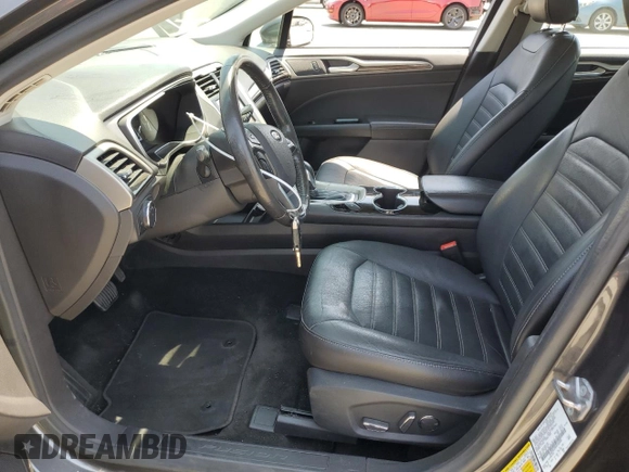 2016 Ford Fusion SE Hybrid with VIN 3FA6P0LU9GR166408, listed as a Copart auction lot 59931995 with 104,560 mi miles and Salvage title. Bid and sale history available at DreamBid. Image 7.
