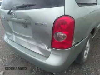 2003 Mazda MPV LX z VIN JM3LW28A630339202, wystawiony jako IAAI lot #34428110 z przebiegiem 209 166 mil mil oraz . Historia ofert i sprzedaży dostępna na DreamBid. Obrazek 6.