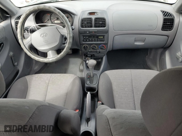 2003 Hyundai Accent GL with VIN KMHCG35C13U270585, listed as a Copart auction lot 50197935 with 53,822 mi miles and Salvage Title. Bid and sale history available at carsss.com. Image 8.