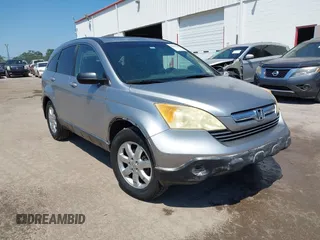 2007 Honda CR-V EX-L with VIN JHLRE38717C022984, listed as a IAAI auction lot 42028185 with 231,040 mi miles and . Bid and sale history available at carsss.com. Image 1.