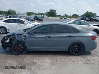 2024 Volkswagen Jetta GLI 40th Anniversary Edition with VIN 3VW9T7BUXRM021579, listed as a IAAI auction lot 42166630 with 24,690 mi miles and . Bid and sale history available at DreamBid. Image 14.
