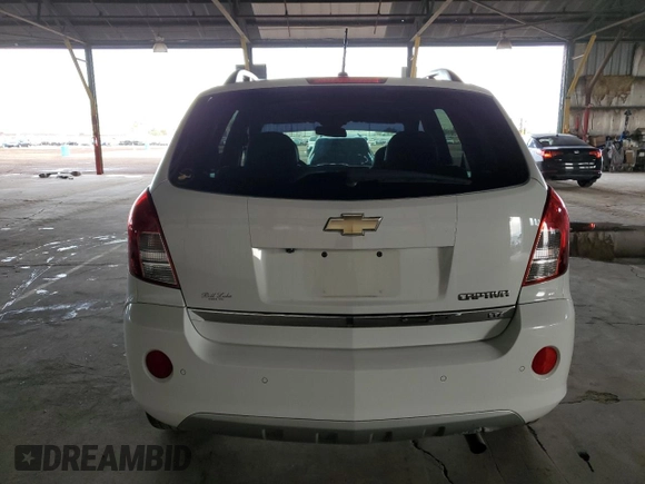 2013 Chevrolet Captiva Sport LTZ with VIN 3GNAL4EK0DS619409, listed as a Copart auction lot 82646974 with 90,590 mi miles and Salvage Title. Bid and sale history available at DreamBid. Image 6.