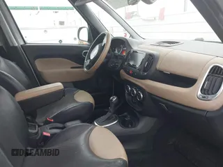 2014 FIAT 500L Lounge z VIN ZFBCFACH8EZ005035, wystawiony jako IAAI lot #41824368 z przebiegiem 80 914 mil mil oraz . Historia ofert i sprzedaży dostępna na DreamBid. Obrazek 5.