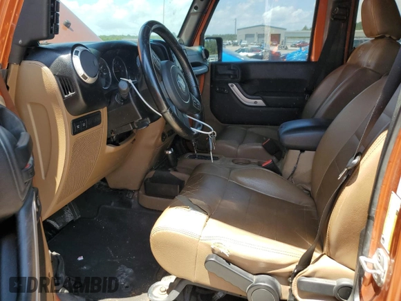 2011 Jeep Wrangler Unlimited Rubicon with VIN 1J4HA6H12BL584493, listed as a Copart auction lot 61765735 with 151,175 mi miles and Salvage title. Bid and sale history available at DreamBid. Image 7.