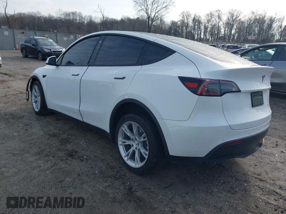 2022 Tesla Model Y Long Range z VIN 7SAYGDEE0NF435252, wystawiony jako IAAI lot #41449612 z przebiegiem 48 671 mil mil oraz . Historia ofert i sprzedaży dostępna na DreamBid. Obrazek 3.