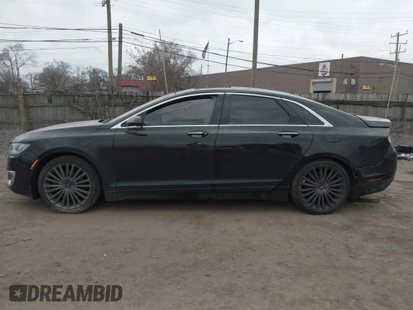 2017 Lincoln MKZ Reserve z VIN 3LN6L5E9XHR649804, wystawiony jako IAAI lot #41906488 z przebiegiem 161 150 mil mil oraz . Historia ofert i sprzedaży dostępna na DreamBid. Obrazek 14.
