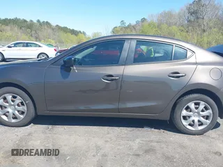 2015 Mazda 3 i SV with VIN JM1BM1T72F1270488, listed as a IAAI auction lot 41827337 with 228,983 mi miles and . Bid and sale history available at DreamBid. Image 14.