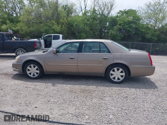 2006 Cadillac DTS 1SD z VIN 1G6KD57Y06U197794, wystawiony jako IAAI lot #42226706 z przebiegiem 135 748 mil mil oraz . Historia ofert i sprzedaży dostępna na DreamBid. Obrazek 14.