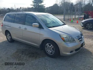 2007 Honda Odyssey EX-L with VIN 5FNRL38697B456356, listed as a IAAI auction lot 41587139 with 194,544 mi miles. Bid and sale history available at carsss.com. Image 1.
