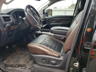 2017 Nissan Titan XD SL with VIN 1N6AA1F41HN548361, listed as a Copart auction lot 84654174 with 142,057 mi miles and Salvage Title. Bid and sale history available at carsss.com. Image 7.
