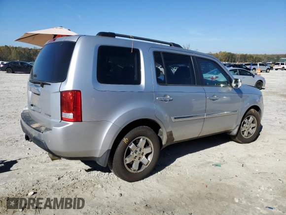 2010 Honda Pilot Touring with VIN 5FNYF3H84AB002687, listed as a Copart auction lot 80246724 with 210,934 mi miles and Salvage Title. Bid and sale history available at DreamBid. Image 3.