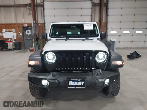 2023 Jeep Wrangler Sport S with VIN 1C4HJXDN2PW632584, listed as a IAAI auction lot 41965191 with 20,288 mi miles and . Bid and sale history available at DreamBid. Image 13.