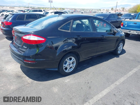 2014 Ford Fiesta SE with VIN 3FADP4BJ1EM204083, listed as a IAAI auction lot 42149088 with 136,209 mi miles and . Bid and sale history available at DreamBid. Image 4.