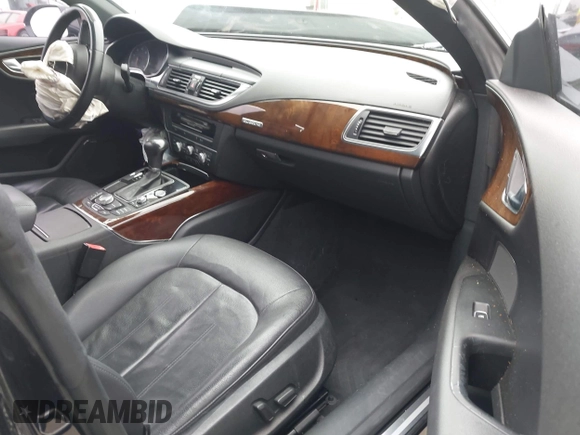 2013 Audi A7 Premium Plus with VIN WAUYGAFC7DN101757, listed as a IAAI auction lot 42485884 with 135,330 mi miles and . Bid and sale history available at DreamBid. Image 5.