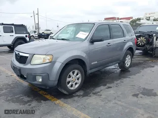 2008 Mazda Tribute Sport with VIN 4F2CZ02Z28KM31700, listed as a IAAI auction lot 41736309 with 235,848 mi miles. Bid and sale history available at carsss.com. Image 2.