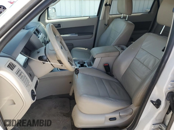 2012 Ford Escape XLT z VIN 1FMCU9DG2CKB54288, wystawiony jako Copart lot #61569655 z przebiegiem 169 899 mil mil oraz Szkoda całkowita • Salvage title. Historia ofert i sprzedaży dostępna na DreamBid. Obrazek 7.