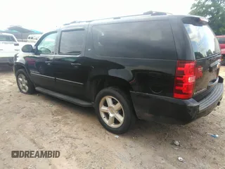 2007 Chevrolet Suburban LTZ with VIN 3GNFC16097G247674, listed as a IAAI auction lot 42168577 with 217,864 mi miles. Bid and sale history available at carsss.com. Image 3.