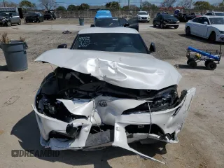 2025 Toyota GR Supra 3.0 with VIN WZ1DB0G09SW069188, listed as a Copart auction lot 49242215 with 0 mi miles and Salvage Title. Bid and sale history available at carsss.com. Image 5.