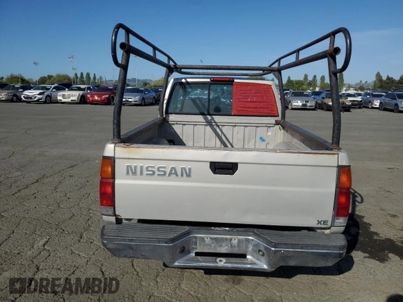 1996 Nissan Frontier XE z VIN 1N6SD11SXTC371962, wystawiony jako Copart lot #52947535 z przebiegiem 256 352 mil mil oraz Czysty tytuł • Clean title. Historia ofert i sprzedaży dostępna na DreamBid. Obrazek 6.