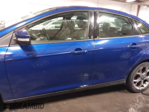 2013 Ford Focus SE z VIN 1FADP3F2XDL124732, wystawiony jako IAAI lot #41510140 z przebiegiem 69 819 mil mil oraz . Historia ofert i sprzedaży dostępna na DreamBid. Obrazek 15.