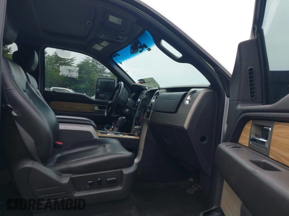 2011 Ford F-150 XLT with VIN 1FTFW1ET7BFA93794, listed as a IAAI auction lot 42185659 with 184,186 mi miles and . Bid and sale history available at carsss.com. Image 5.