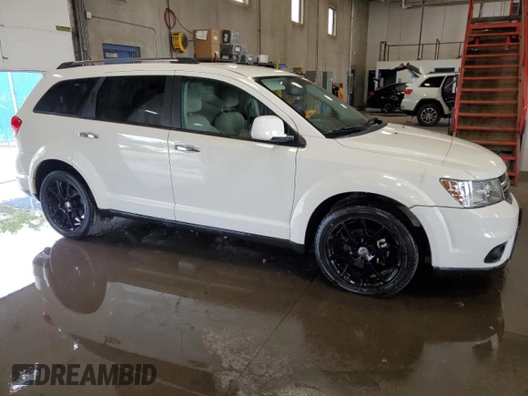 2012 Dodge Journey Crew z VIN 3C4PDCDG6CT184654, wystawiony jako Copart lot #64271625 z przebiegiem 187 734 mil mil oraz Szkoda całkowita • Salvage title. Historia ofert i sprzedaży dostępna na DreamBid. Obrazek 4.